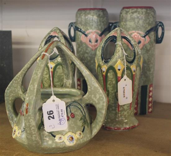 Pair of early 20C Royal Dux Secessionist vases with pierced arched tops & a similar four-handled jardiniere